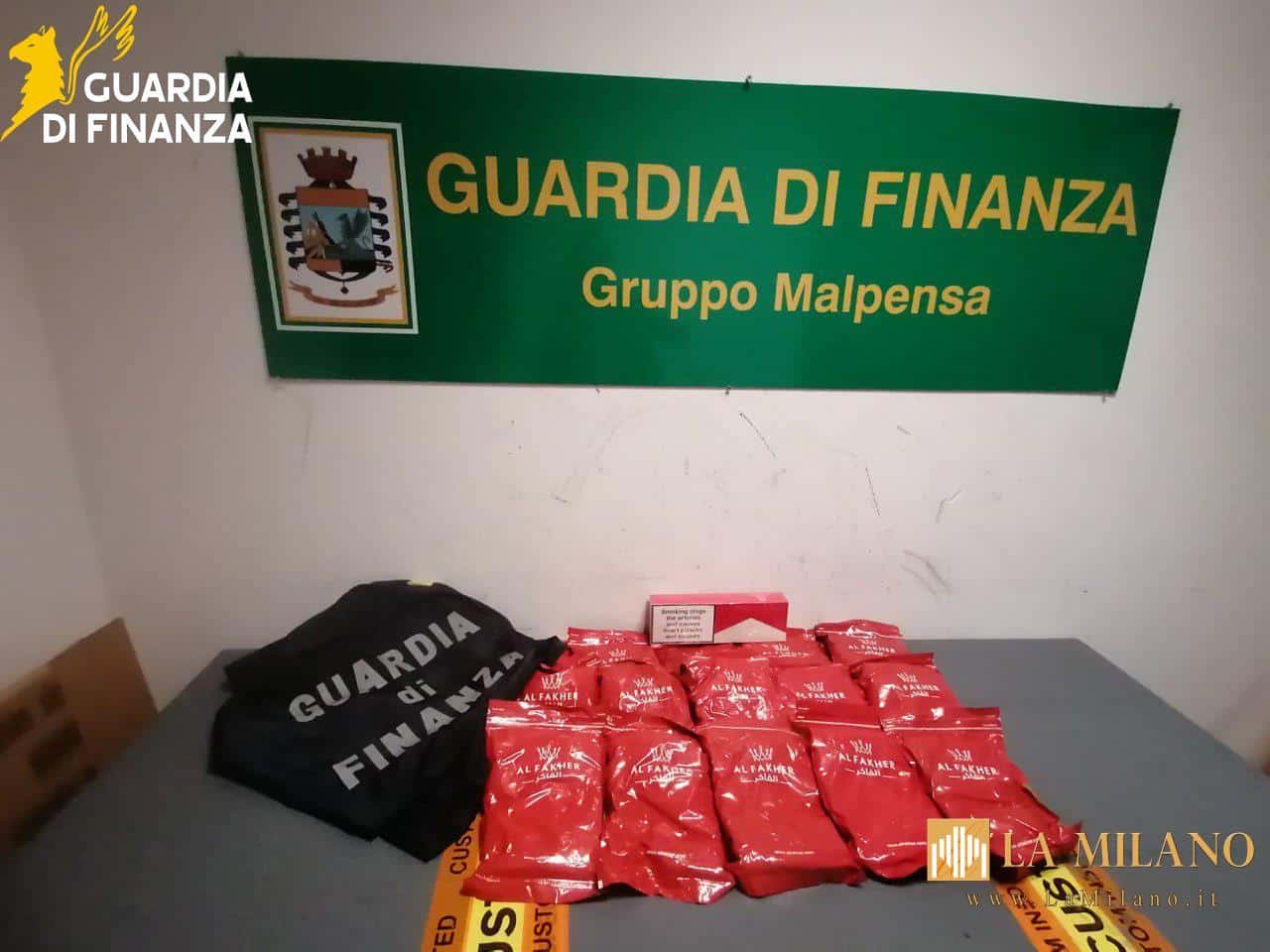 Varese, la Guardia di Finanza sequestra 2.500 stecche di sigarette e 160 kg di melassa di contrabbando a Malpensa