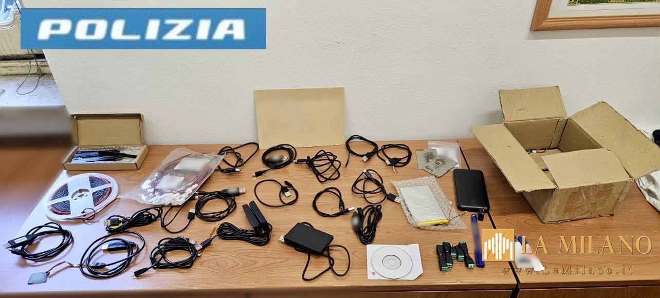 Agenti della Polizia di Stato impegnati in un’operazione a Torino contro la clonazione di carte di pagamento